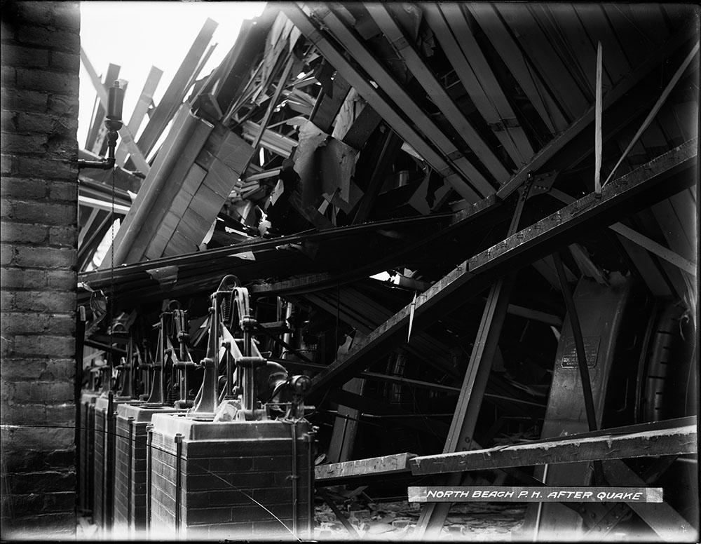 A large rotary generators lie underneath the collapsed roof.