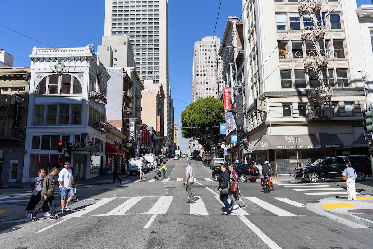Pedestrians in crosswalk on Sutter Street at Grant  Street