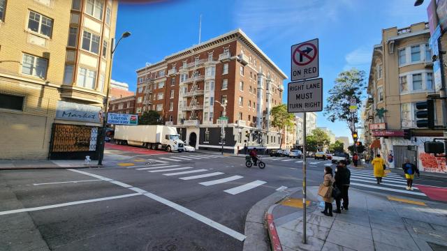 Hyde and Geary crosswalk safety treatments post implementation, advanced limit lines, crosswalk , no right turn on red sign 
