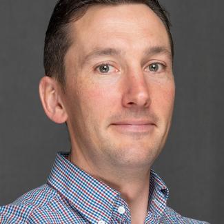 Portrait of Mechanical Systems & Tank Program Engineer John Becker