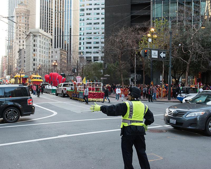 SFMTA Traffic Control Officers assist motorists around the Chinese New Year's parade