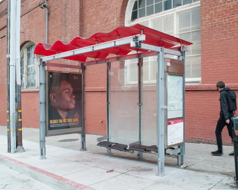 Bus shelter with red wave roof