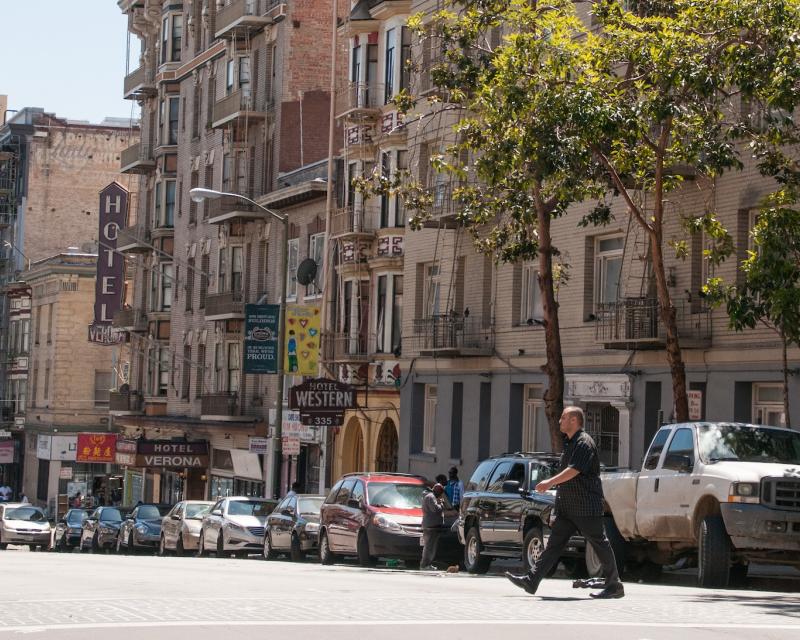 People crossing the street in the Tenderloin