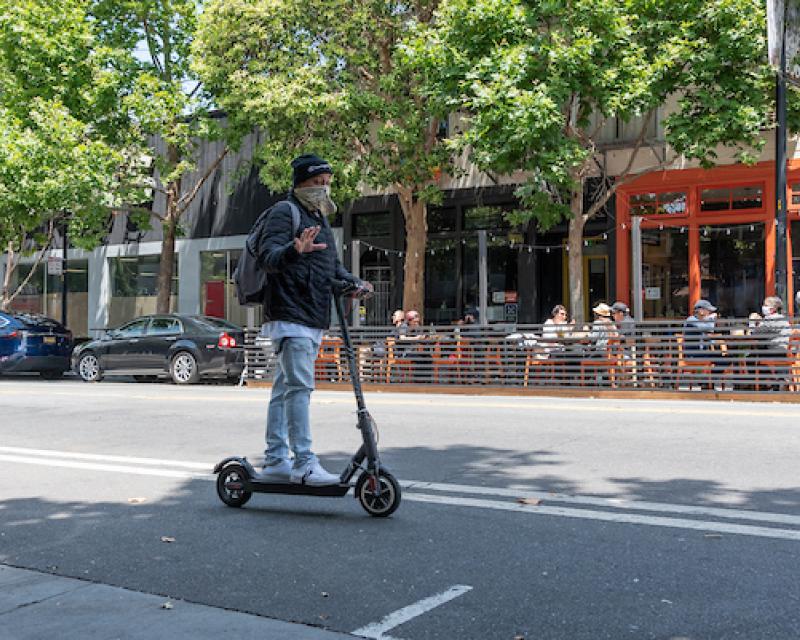 Patron on Scooter