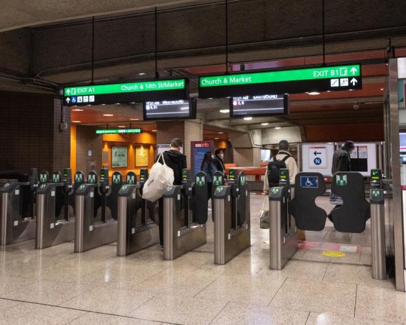 people entering the subway