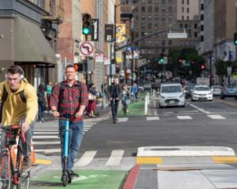 Scooter and bike riding in San Francisco downtown