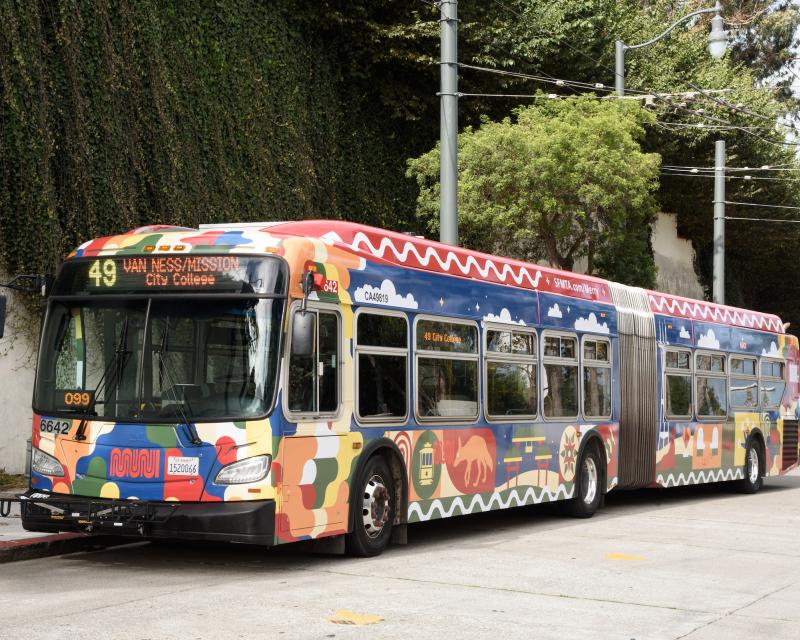49 Van Ness wrapped in Merry Days of Muni design. 