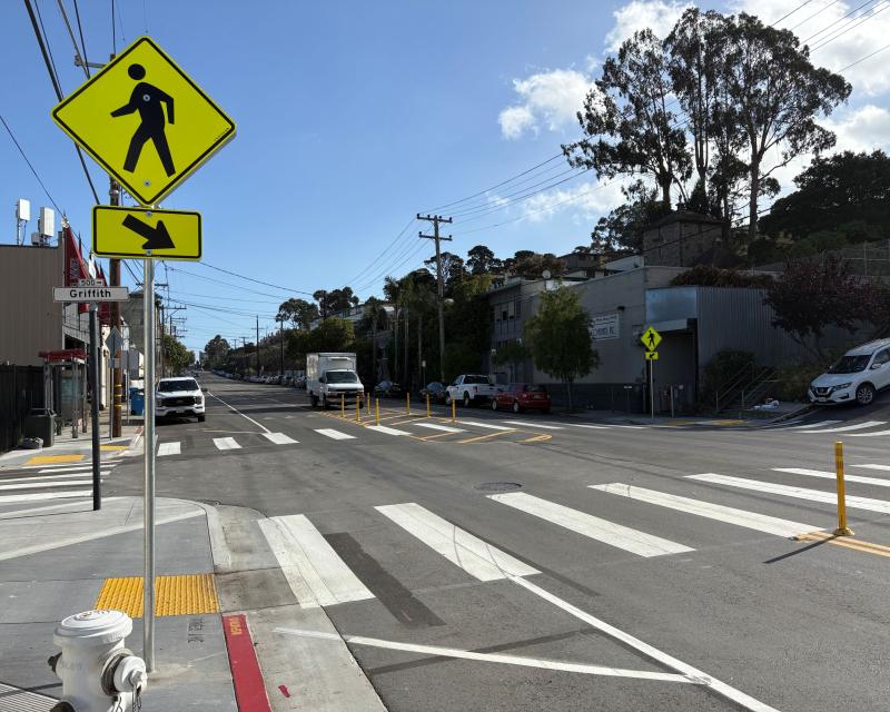 Crosswalk with flex posts at intersection of Innes and Griffith