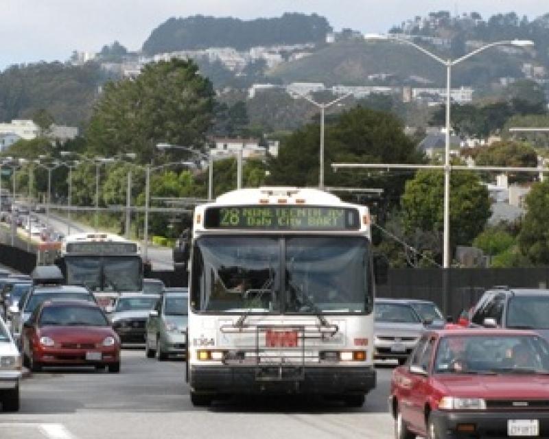 28 19th Ave bus in traffic on 19th Ave