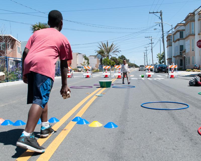 Children playing at a Play Streets block party