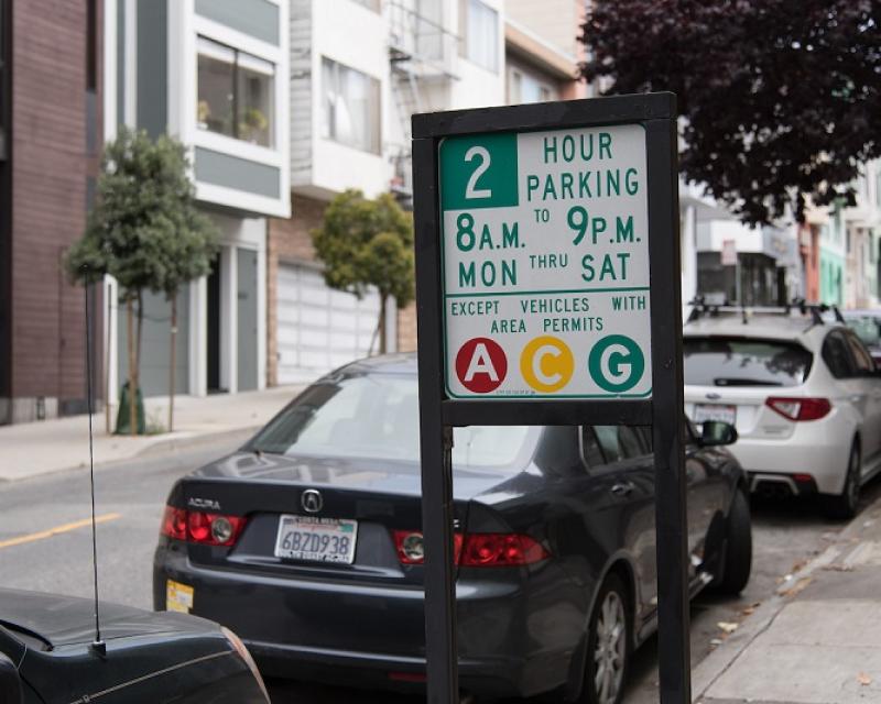 A permit parking sign.