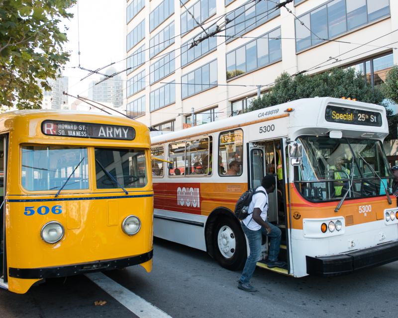 two muni trolley coaches