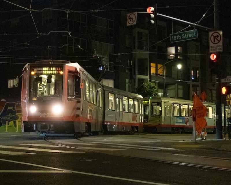 Trains using the Mission Bay Loop on 18th Street