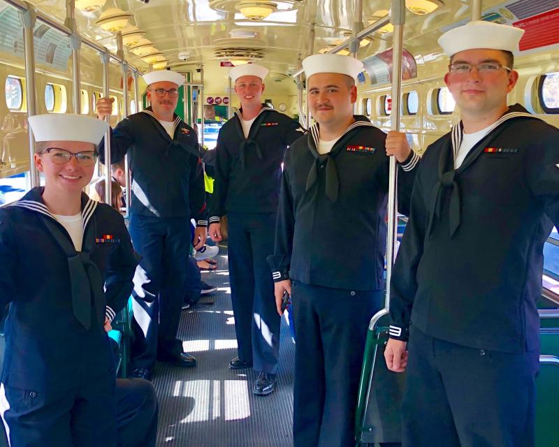 Sailors riding the F Market during Fleetweek