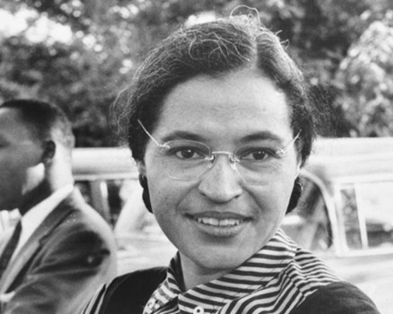 Portrait of Rosa Parks with Martin Luther King Behind her
