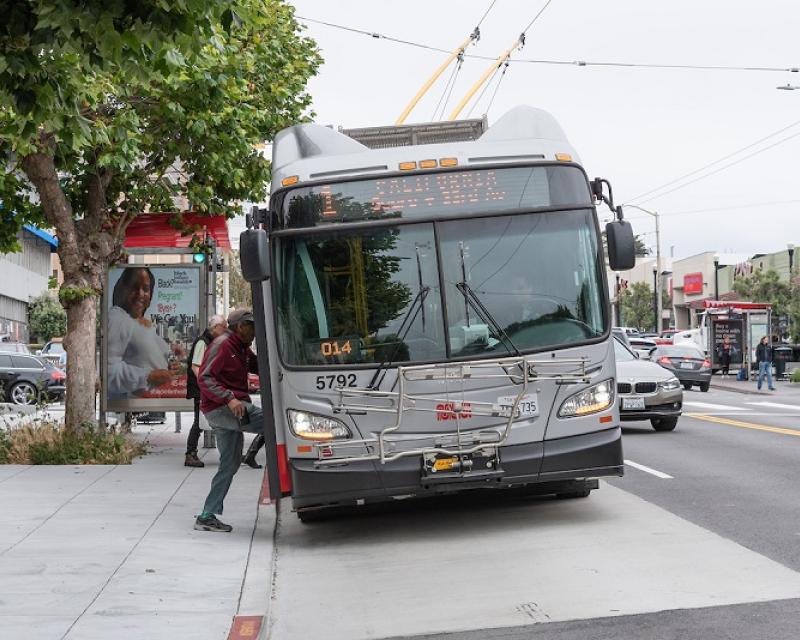 1 California coach picking people up.