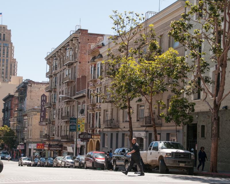 A person crossing the street on Leavenworth Street