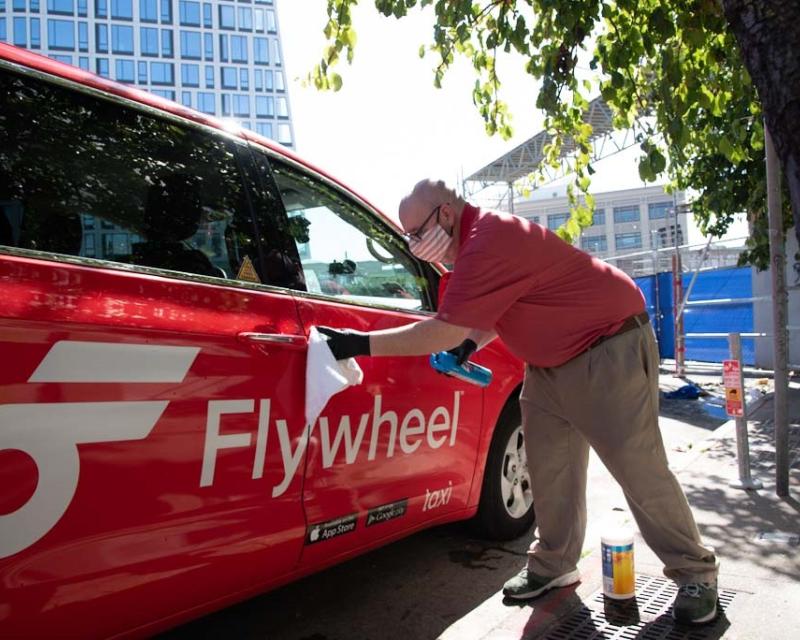 Corey Lamb cleaning his taxi