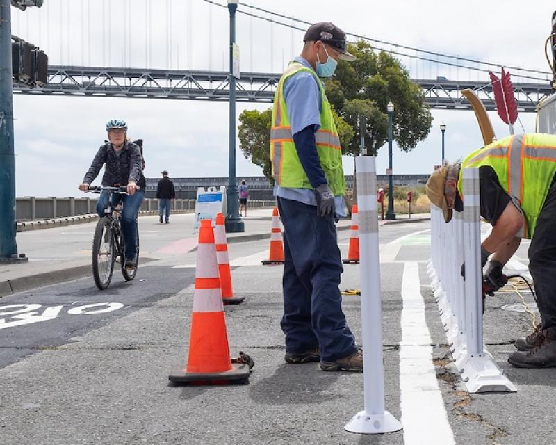 Sign Shop Crew Installing Safe Hit Posts Along New Bicycle Lanes on Embarcadero 
