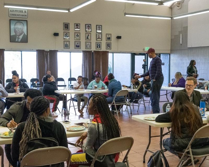 Photo of students and SFMTA staff in a Youth Summit workshop