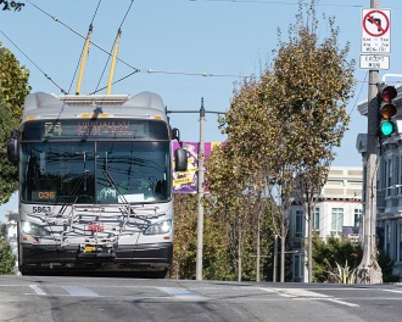 Photo of the 24 Divisadero with a left turn restriction sign 