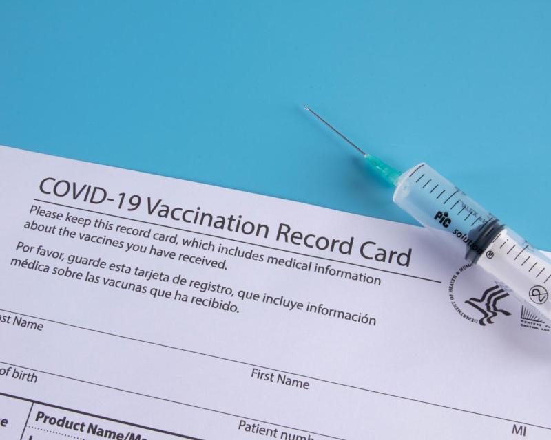 Covid card and syringe