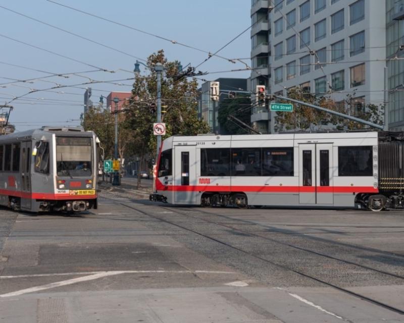 photo of two KT Ingleside-Third trains at 4th and King streets