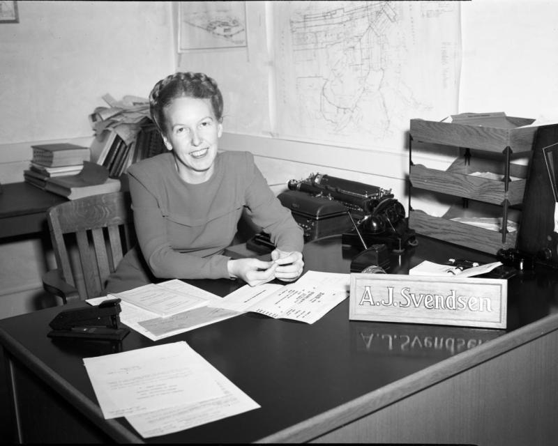 Adeline Svendsen sits at her desk in the Geneva Carhouse office building in this 1949 shot.