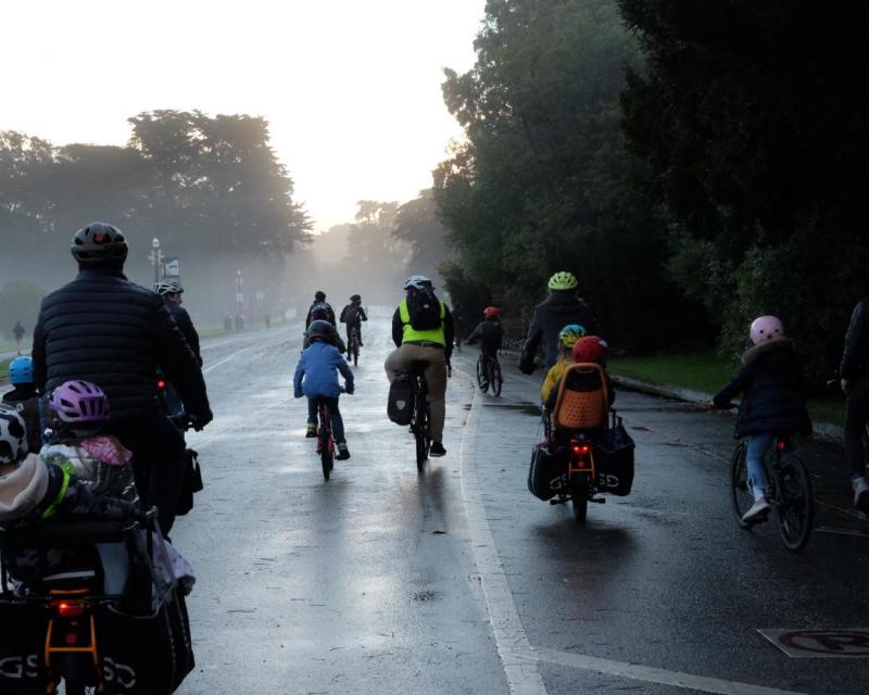 Families and kids biking down car-free JFK Drive in Golden Gate Park