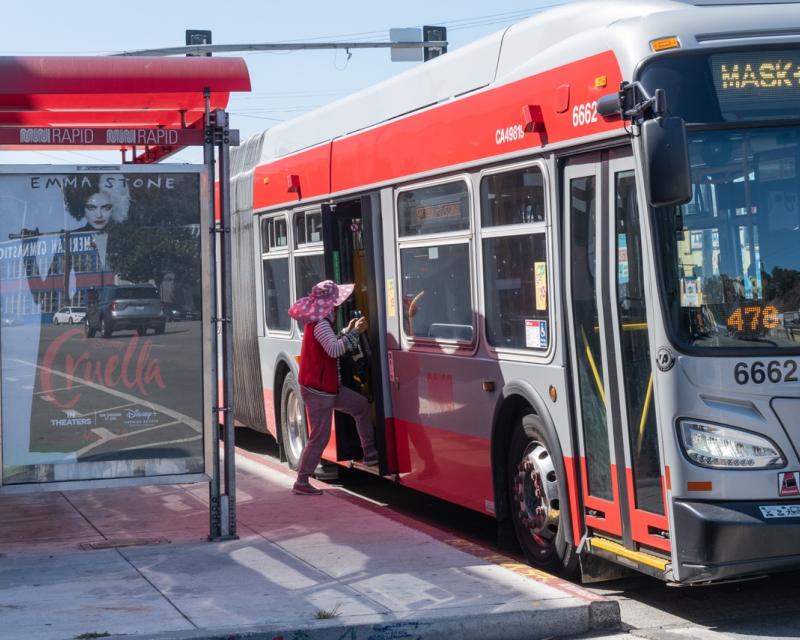 Passenger boarding a bus on Bayshore