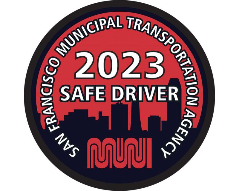 Badge with the text "San Francisco Municipal Transportation Agency 2023 Safe Driver" and the Muni worm logo
