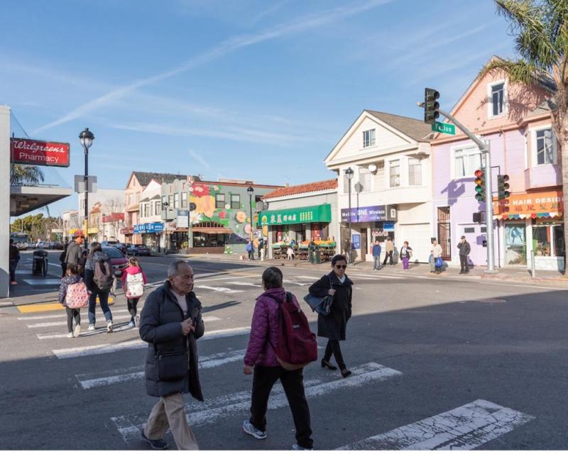 pedestrians using a crosswalk to cross the street at Felton street and San Bruno Avenue