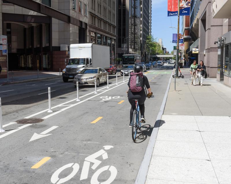 cylclist in two-way protected bike lane 