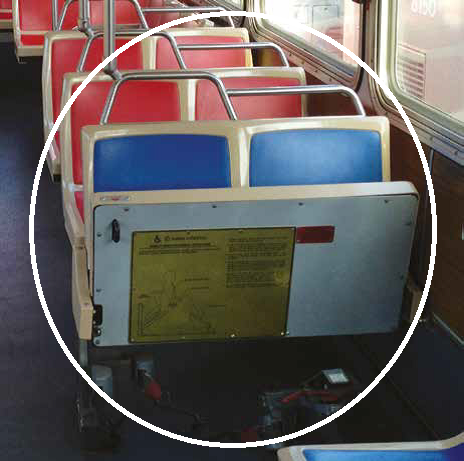 Picture with the first row of forward facing seats circled, to indicate that these are the seats which are being modified.