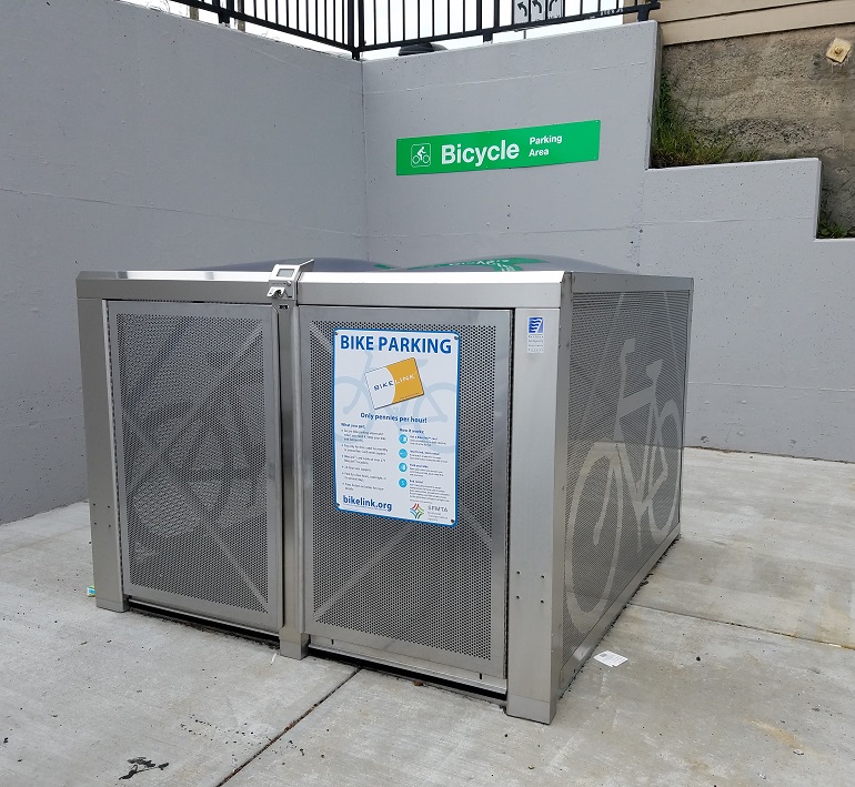 A pair of outdoor bike lockers.