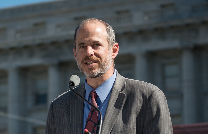 Ed Reiskin speaking at a podium.