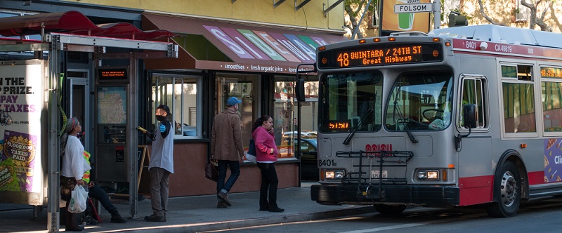 A 48 Quintara coach picking up people.