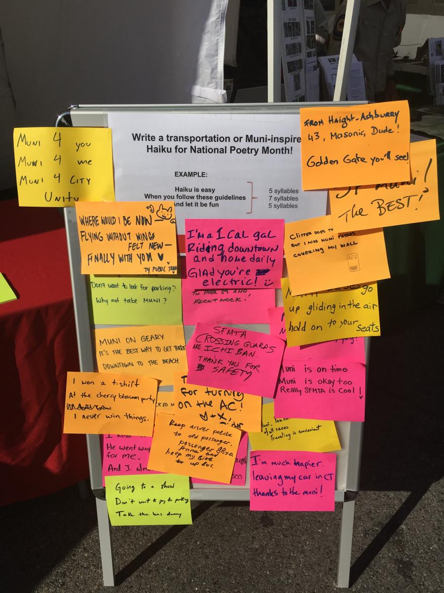 Board covered with poems on brightly colored paper