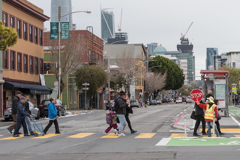 People crossing the road.