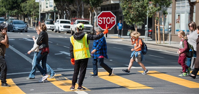 Kids crossing the street.