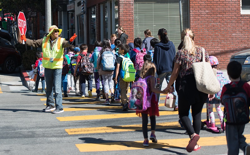 Kids crossing the street.