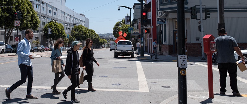 People crossing the street in Dogpatch.