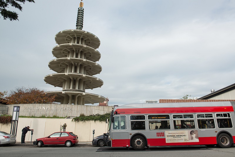 A 38 coach stopping outside of Japantown.