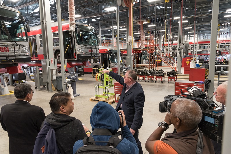 John Haley showing people around the new Islais Creek facility.