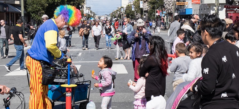 People having fun at Sunday Streets in the Mission.