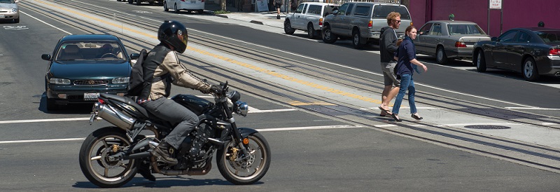 A motorcycle waiting to turn.