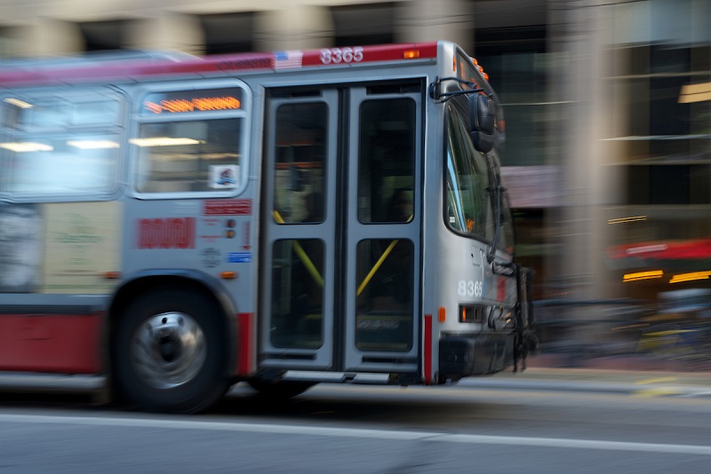 A Muni bus driving.