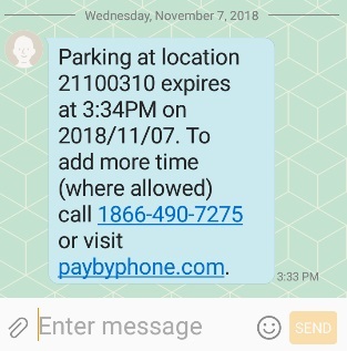 Text message confirming parking payment at the location in question