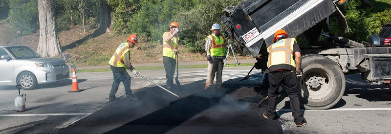 SFMTA crews working on speed humps.