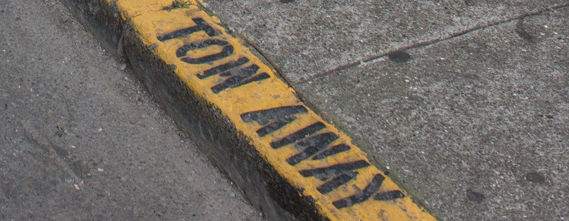 New Logo On Yellow Curb